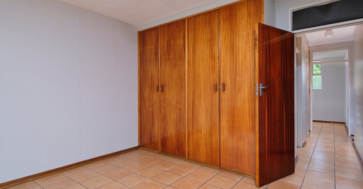 Do you put carpet under fitted wardrobes?